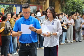 Thí sinh dự thi môn Ngữ văn. (Ảnh: Hoài Nam/Vietnam+)
