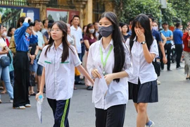 Thí sinh dự thi môn Ngữ văn. (Ảnh: PV/Vietnam+)