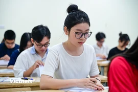 Thí sinh dự thi Tốt nghiệp Trung học phổ thông. (Ảnh: Minh Sơn/Vietnam+)