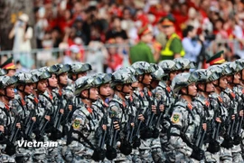 Các chiến sỹ đặc nhiệm dù trong lễ diễu binh, diễu hành. (Ảnh: PV/Vietnam+)