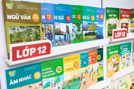 Sách giáo khoa sẽ được chỉnh sửa để phù hợp với bộ máy hành chính mới. (Ảnh: PV/Vietnam+)
