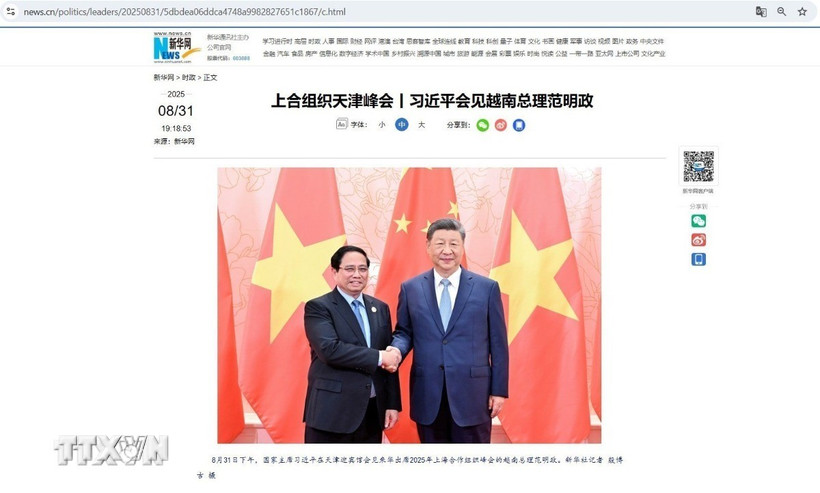 Tân Hoa Xã đưa tin về cuộc hội kiến giữa Chủ tịch Trung Quốc Tập Cận Bình và Thủ tướng Chính phủ Phạm Minh Chính. (Ảnh: TTXVN phát) 