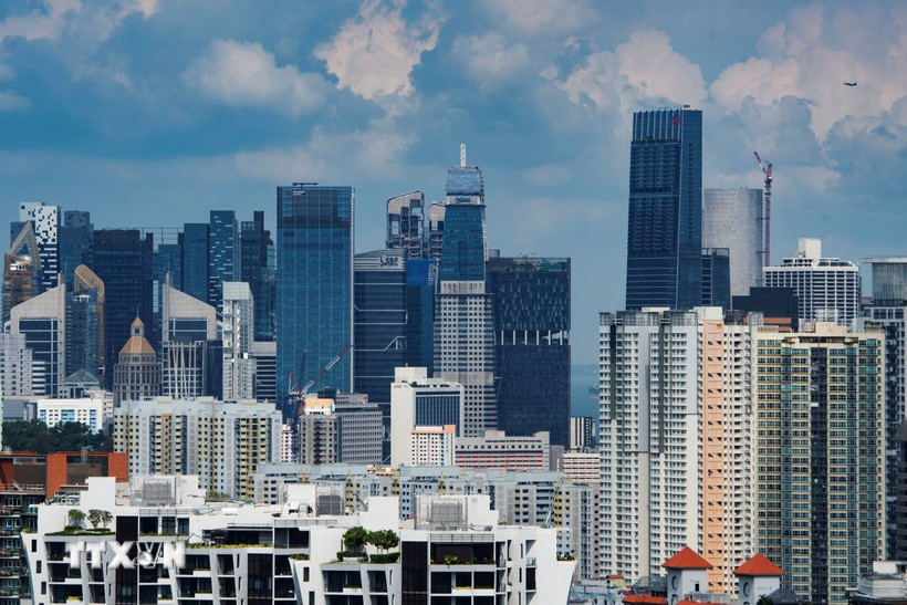 Từng được ca ngợi với bầu trời dày đặc cao ốc và bộ máy vận hành trơn tru, ngành tài chính Singapore đang bước vào giai đoạn tái cấu trúc mạnh mẽ. Ảnh: Quang cảnh Singapore. (Ảnh: THX/TTXVN) 