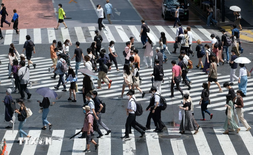 Người dân tại Tokyo, Nhật Bản. (Ảnh: AFP/TTXVN)