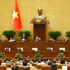 Quốc hội thảo luận về kết quả phát triển kinh tế-xã hội, ngân sách nhà nước năm 2024. (Ảnh: TTXVN)