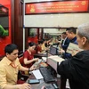 Giá vàng tiếp đà giảm 500.000 đồng mỗi lượng chiều bán ra 2 Một điểm kinh doanh vàng tại Hà Nội. (Ảnh: Đức Duy/Vietnam+)