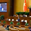 Bộ trưởng Bộ Giáo dục và Đào tạo Nguyễn Kim Sơn trả lời chất vấn. (Ảnh: TTXVN)