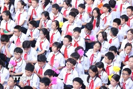 Học sinh Trường THCS Giảng Võ tại lễ khai giảng năm học mới 2024-2025. (Ảnh: Văn Điệp/TTXVN)