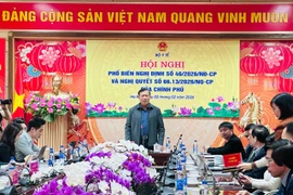 Thứ trưởng Bộ Y tế Đỗ Xuân Tuyên phát biểu tại Hội nghị. (Ảnh: T.G/Vietnam+)