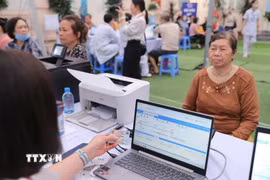 Mô hình dữ liệu cập nhật vào hồ sơ sức khỏe toàn dân để người dân theo dõi kết quả xét nghiệm, khám chữa bệnh của mình trên VNeID. (Ảnh: Minh Quyết/TTXVN)