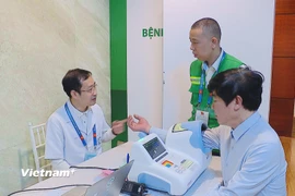 Các bác sỹ, điều dưỡng đều sẵn sàng trong mọi tình huống. (Ảnh: Vũ Kiểm/Vietnam+)
