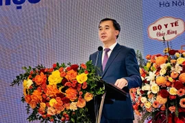 Thứ trưởng Bộ Y tế Trần Văn Thuấn phát biểu tại hội nghị. (Ảnh: PV/Vietnam+)