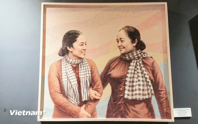 "Hai bông hồng thép trong kháng chiến chống Mỹ" của họa sỹ Nguyễn Thu Thủy. (Ảnh: Minh Thu/Vietnam+) vnp-thuthuy-6.jpg