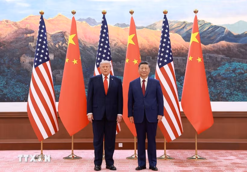 Chủ tịch Trung Quốc Tập Cận Bình (phải) trong cuộc hội đàm với Tổng thống Mỹ Donald Trump (trái, phía trước) đang ở thăm Bắc Kinh, ngày 14/5/2026. (Ảnh: THX/TTXVN)