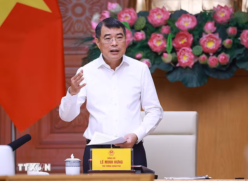 Thủ tướng Lê Minh Hưng chủ trì làm việc với lãnh đạo Bộ Tư pháp. (Ảnh: Dương Giang/TTXVN)