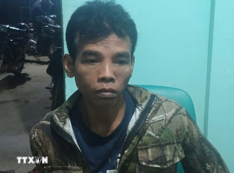 Đối tượng Điểu Trung bị bắt. (Ảnh: TTXVN phát)