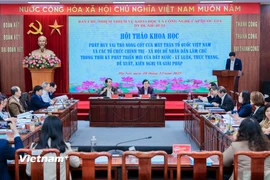 Hội thảo "Phát huy vai trò nòng cốt của Mặt trận Tổ quốc Việt Nam và các tổ chức chính trị - xã hội để nhân dân làm chủ trong thời kỳ phát triển mới của đất nước - Lý luận, thực trạng, đề xuất, kiến nghị và giải pháp" tổ chức chiều nay 18/12. (Ảnh: Hoài Nam/Vietnam+)