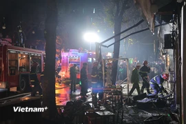 Hiện trường vụ cháy tối ngày 8/3 trên đường Mậu Lương (Hà Đông, Hà Nội). (Ảnh: Hoài Nam/Vietnam+)