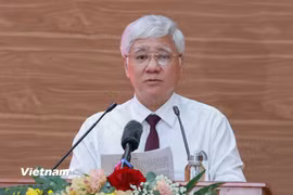 Ông Đỗ Văn Chiến, Ủy viên Bộ Chính trị, Bí thư Trung ương Đảng, Bí thư Đảng ủy Mặt trận Tổ quốc, các đoàn thể Trung ương, Chủ tịch Ủy ban Trung ương Mặt trận Tổ quốc Việt Nam trình bày báo cáo tại cuộc làm việc. (Ảnh: PV/Vietnam+)