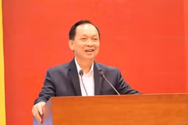 Phó Chủ tịch kiêm Tổng Thư ký Hiệp hội Ngân hàng Việt Nam Đào Minh Tú phát biểu tại Hội nghị. (Ảnh: Vietnam+)
