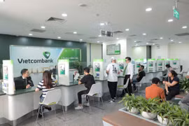 Vietcombank dành 50.000 tỷ đồng giảm tối thiểu 1% lãi suất cho doanh nghiệp. (Ảnh: Vietnam+)