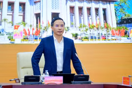 Thống đốc Ngân hàng Nhà nước Phạm Đức Ấn phát biểu tại cuộc họp. (Ảnh: Vietnam+)