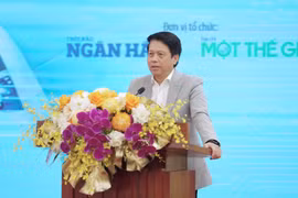 Phó Thống đốc Ngân hàng Nhà nước Phạm Tiến Dũng phát biểu khai mạc Diễn đàn. (Ảnh: Vietnam+)