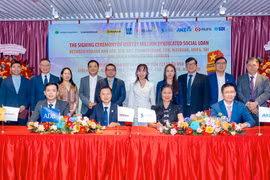 Lễ ký kết khoản vay xã hội hợp vốn quốc tế 721 triệu USD - dấu mốc mới trên hành trình kết nối nguồn vốn toàn cầu vì phát triển bền vững tại Việt Nam. (Ảnh: Vietnam+)