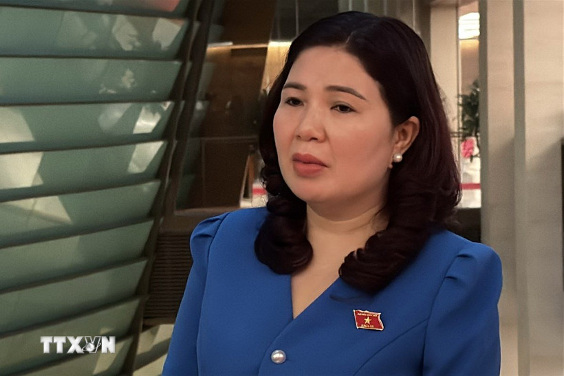 Đại biểu Trần Thị Vân (Bắc Ninh) trả lời phỏng vấn. (Ảnh: Hải Ngọc/TTXVN)