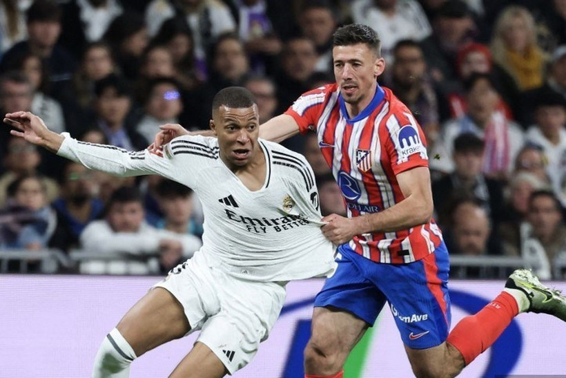 Real và Atletico chia điểm trong trận derby Madrid. (Nguồn: AFP)