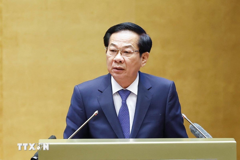 Ông Đỗ Thanh Bình, Ủy viên Trung ương Đảng, Bộ trưởng Bộ Nội vụ trình bày Hướng dẫn nghiệp vụ công tác tổ chức bầu cử đại biểu Quốc hội khóa XVI và đại biểu Hội đồng nhân dân các cấp nhiệm kỳ 2026-2031. (Ảnh: Doãn Tấn/TTXVN)