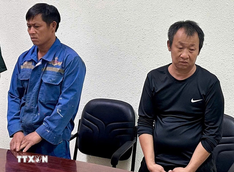 Các đối tượng tại Cơ quan Công an. (Ảnh: TTXVN phát)