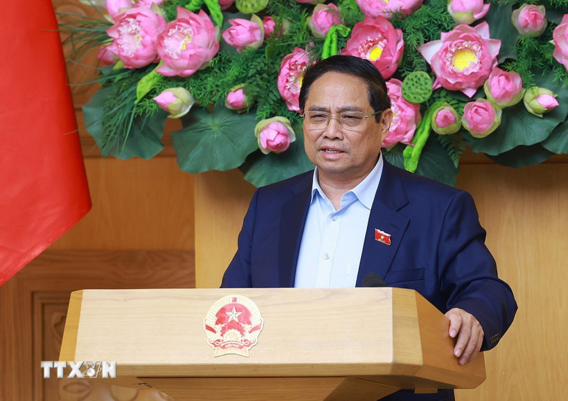 Thủ tướng Phạm Minh Chính chủ trì họp đánh giá tác động của các cuộc xung đột trên thế giới ảnh hưởng đến tình hình kinh tế-xã hội trong nước. (Ảnh: Dương Giang/TTXVN)
