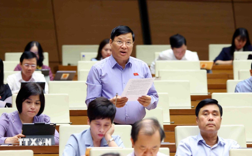 Đại biểu Quốc hội tỉnh Vĩnh Phúc Trần Văn Tiến phát biểu. (Ảnh: Phạm Kiên/TTXVN)