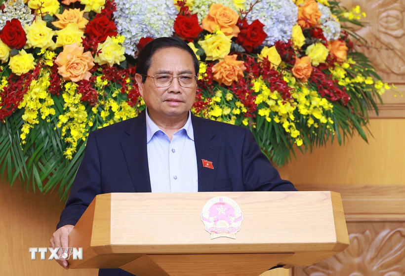Thủ tướng Phạm Minh Chính chủ trì cuộc họp với Hội đồng Tư vấn chính sách về phát triển kinh tế tư nhân. (Ảnh: Dương Giang/TTXVN)