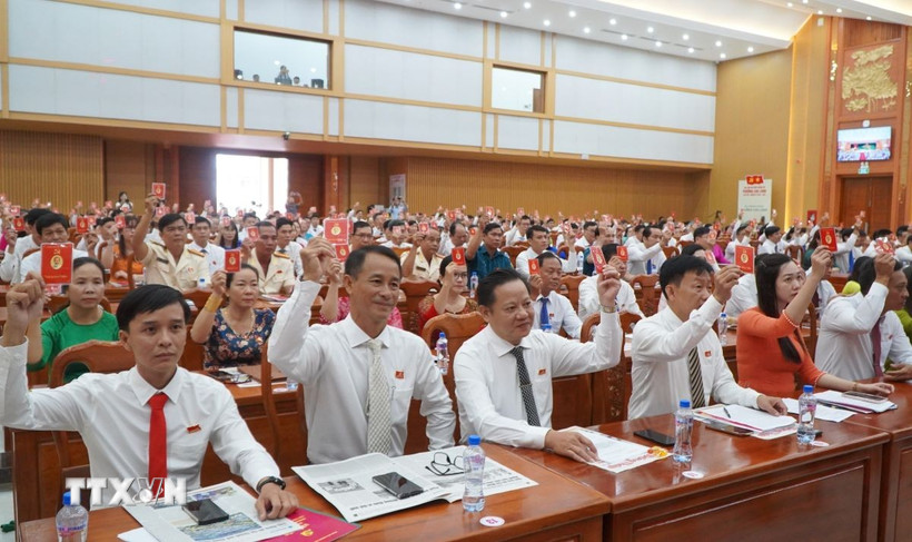 Đại biểu biểu quyết nhiều nội dung quan trọng tại Đại hội. (Ảnh: Nhựt An/TTXVN)