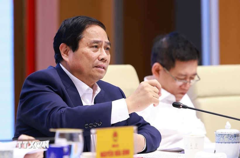 Thủ tướng Phạm Minh Chính chủ trì Phiên họp thứ hai của Ban Chỉ đạo về phát triển khoa học, công nghệ, đổi mới sáng tạo, chuyển đổi số và Đề án 06. (Ảnh: Dương Giang/TTXVN)