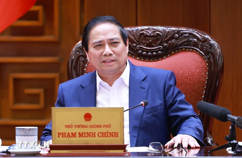 Thủ tướng Phạm Minh Chính chủ trì cuộc họp về dự thảo phát triển giáo dục, đào tạo và chăm sóc sức khoẻ nhân dân. (Ảnh: Dương Giang/TTXVN)