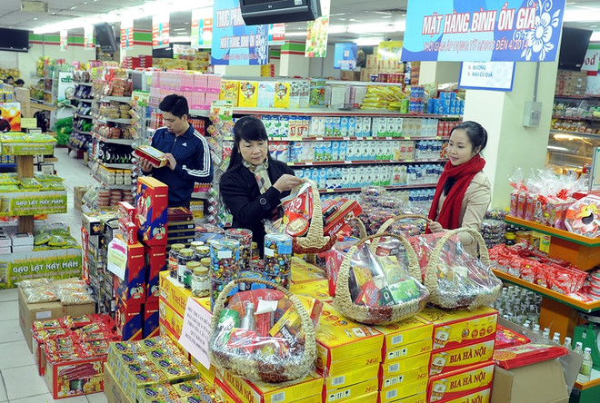 Thị trường Tết tăng nhiệt, doanh nghiệp bận rộn phục vụ khách hàng ảnh 1