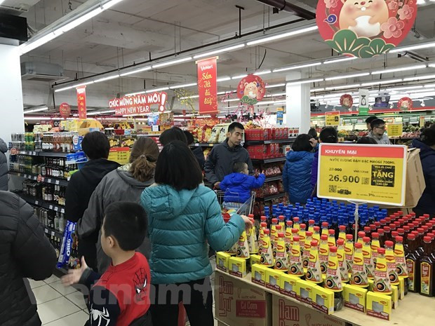 Các doanh nghiệp sẵn sàng các phương án nhằm đảm bảo nhu cầu mua sắm và tiêu dùng trong dịp cuối năm và Tết Nguyên đán sắp tới. (Ảnh: Đức Duy/Vietnam+) Không để thiếu hàng, sốt giá dịp cuối năm và Tết Nguyên đán Nhâm Dần ảnh 1