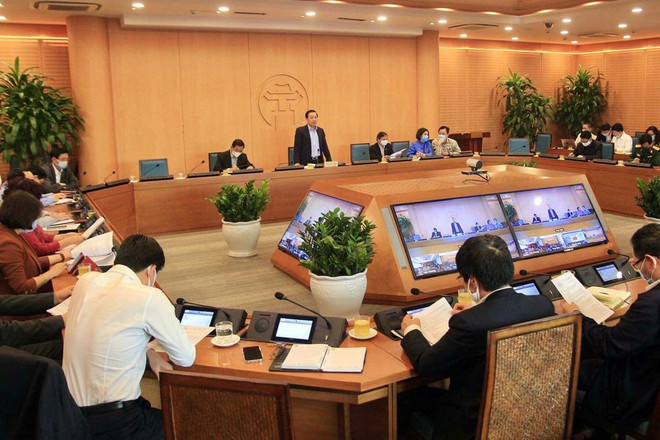 Cuộc họp của Ban Chỉ đạo COVID-19 thành phố Hà Nội. (Ảnh: PV/Vietnam+) Hà Nội chưa chính thức 'chốt' ngày cho học sinh trở lại trường ảnh 2