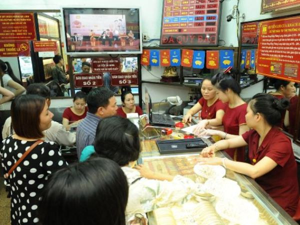 Giá vàng SJC trong nước lại giảm dưới mốc 36 triệu đồng mỗi lượng ảnh 1