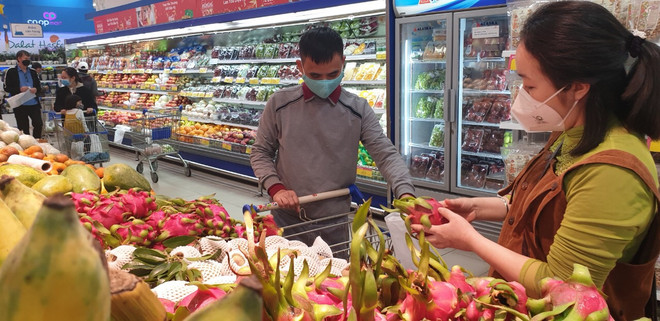 Sức mua tăng dịp cận Tết, giá cả hàng thiết yếu tương đối bình ổn ảnh 2