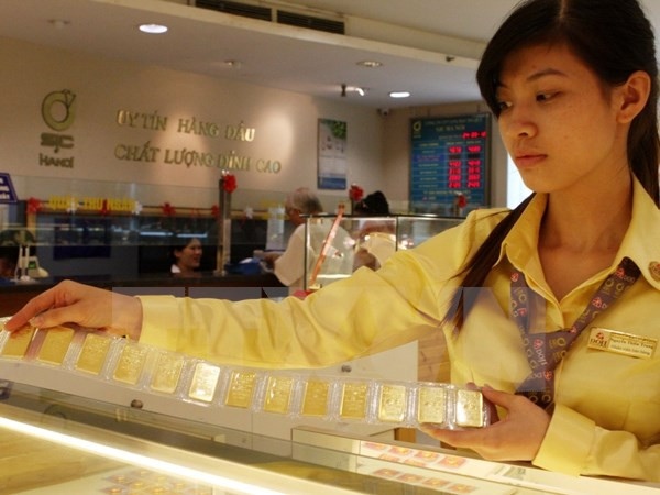 Giá vàng đồng loạt đi xuống, tỷ giá trung tâm tăng 4 đồng một USD ảnh 1
