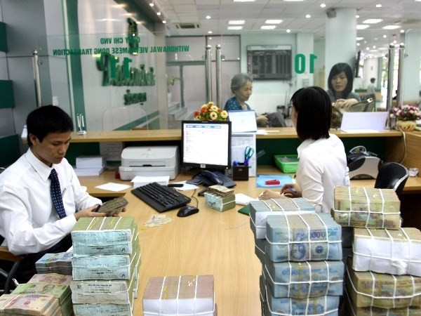 Ảnh chỉ mang tính minh họa (Nguồn: TTXVN) Chính phủ ưu tiên giải quyết vấn đề nợ xấu của các ngân hàng ảnh 1