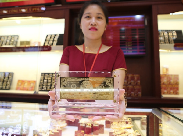 Giá vàng Rồng Thăng Long và SJC cùng tăng mạnh theo đà thế giới ảnh 1