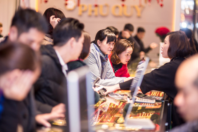 Giá vàng đồng loạt tăng, tỷ giá trung tâm thêm 20 đồng ảnh 1