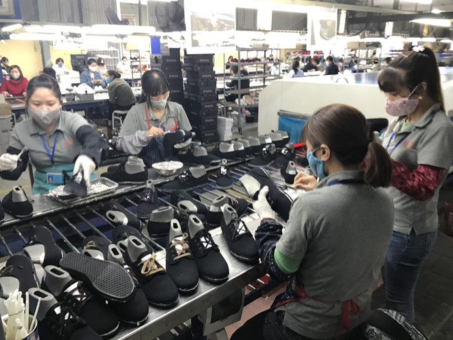 Doanh nghiệp tăng tốc sản xuất ngay sau Tết, đón đầu cơ hội mới ảnh 1