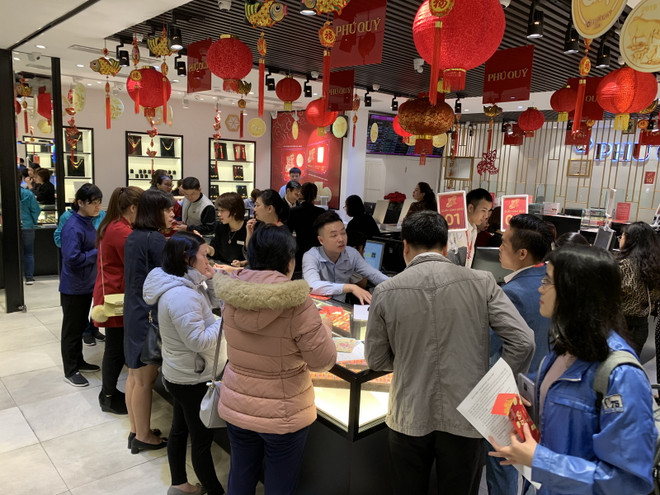 Giá vàng SJC trong nước ổn định, tỷ giá trung tâm giảm 2 đồng ảnh 1