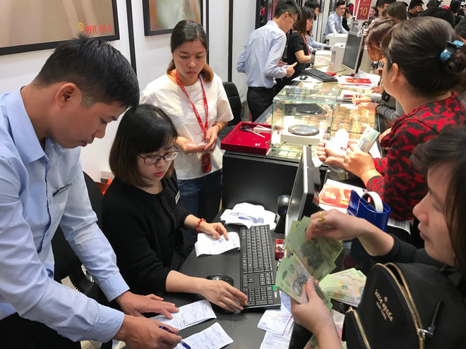 Giá vàng SJC quay đầu giảm, tỷ giá trung tâm tăng thêm 10 đồng ảnh 1